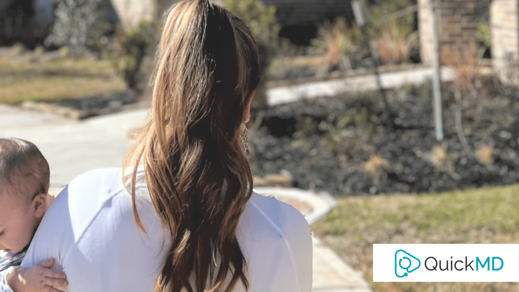 Woman walking with her baby after a QuickMD telemedicine appointment about women's health