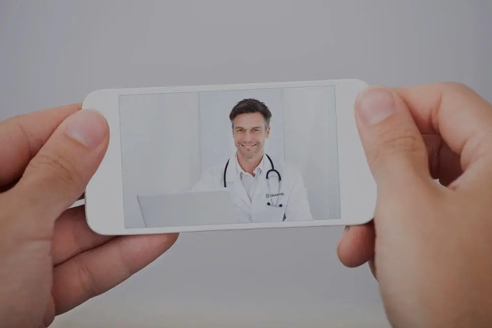 Doctor speaking with a patient via telehealth