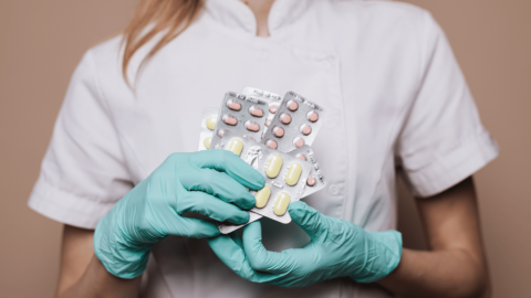 Doctor holding antibiotics for bronchitis|Woman with chronic obstructive pulmonary disease smoking