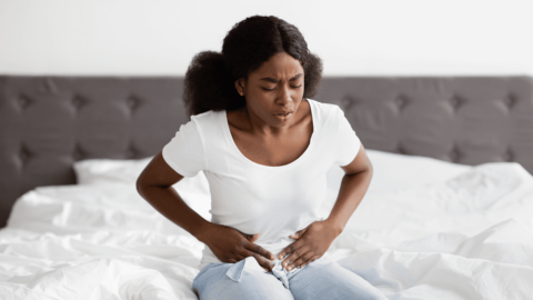 Woman with morning sickness symptoms|