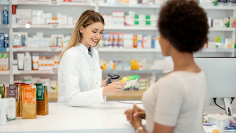 Pharmacist assisting a patient with semaglutide vs tirzepatide medication options