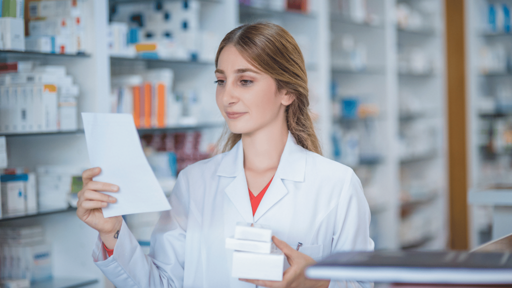 Pharmacist applying a Wegovy coupon to a prescription