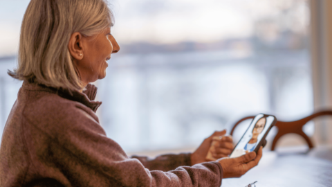 Woman speaking with telehealth urgent care doctor at QuickMD