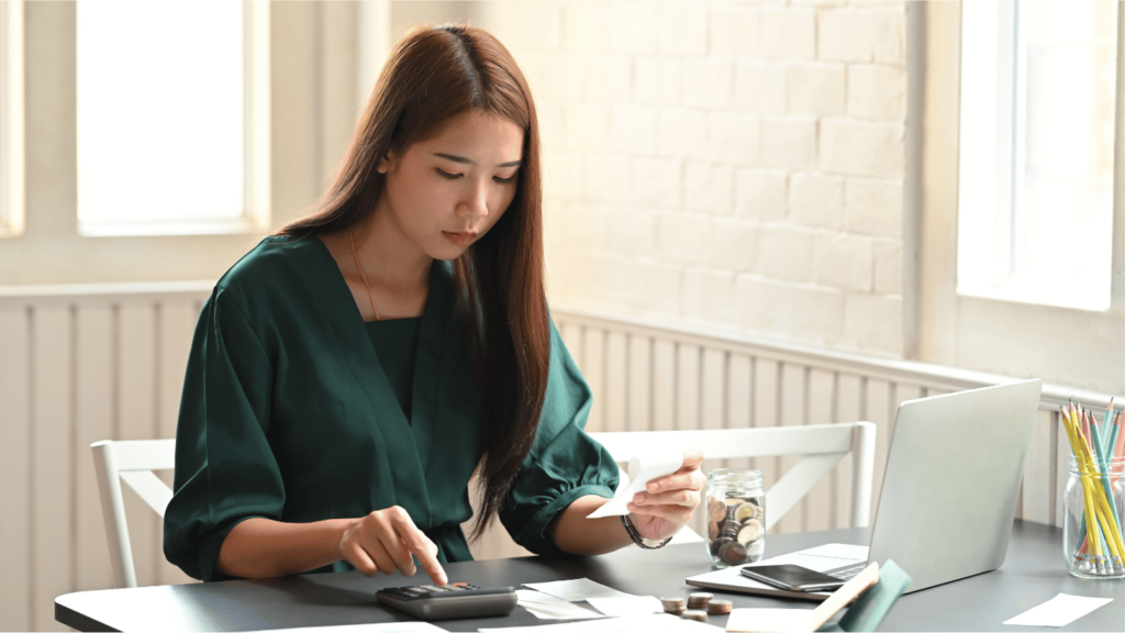 Woman calculating the cost of weight loss medications