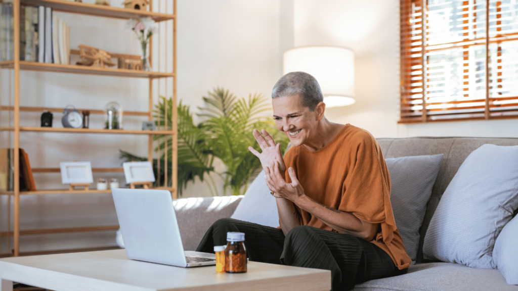 Woman on couch meeting with telemat doctor for suboxone treatment