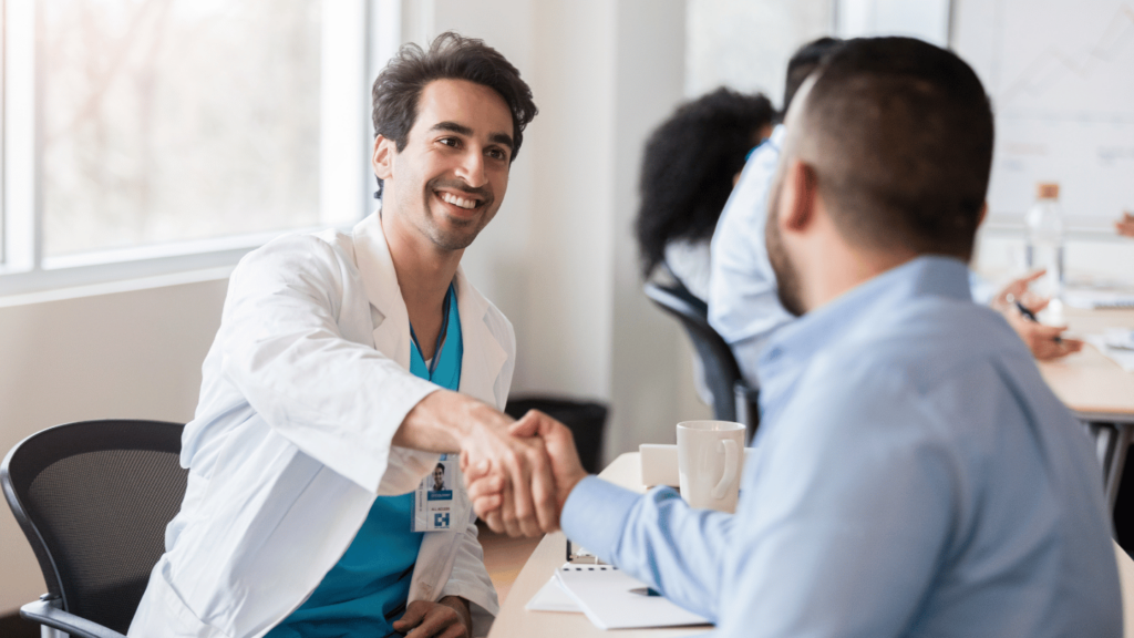 Doctor shaking hands with a patient after explaining how to start Ozempic