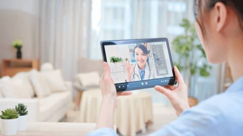 Woman meeting with a doctor via Tele-MAT