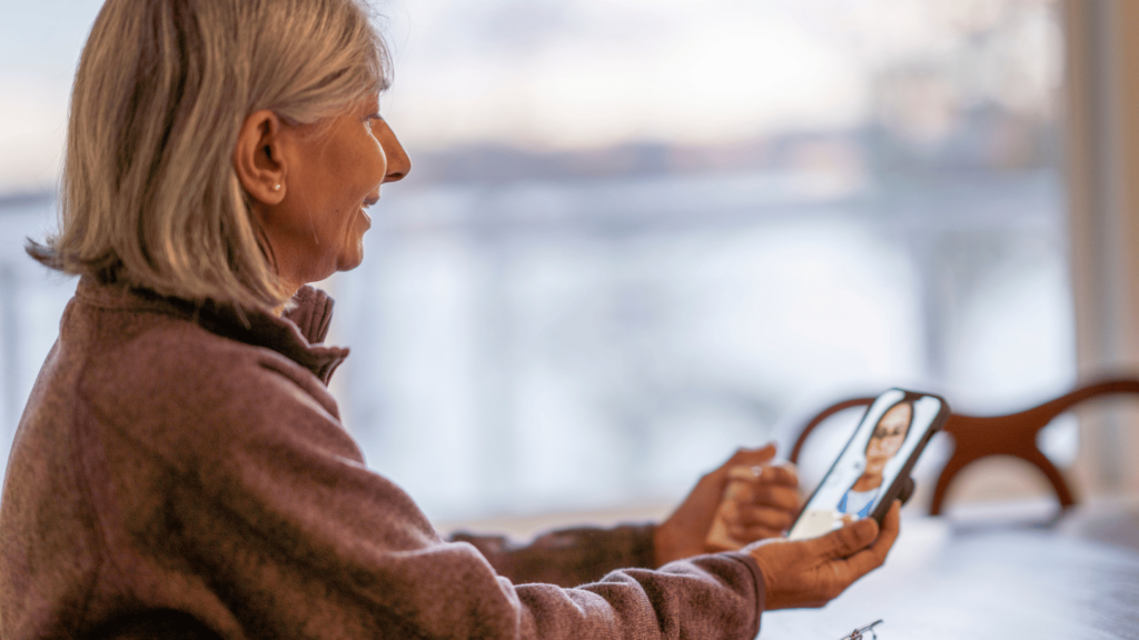 Woman meeting with a doctor via telehealth