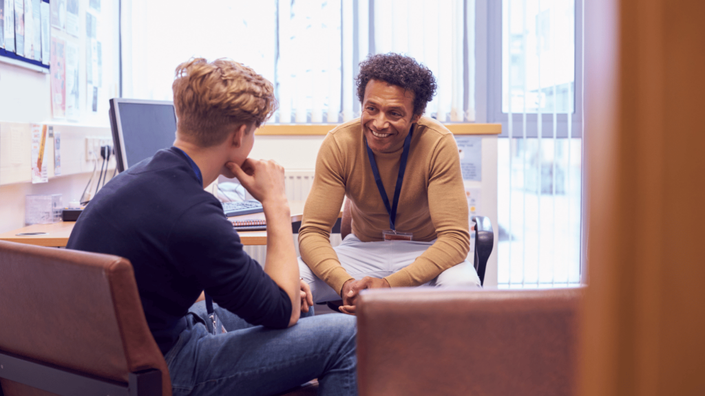 Man counseling someone through opioid addiction recovery