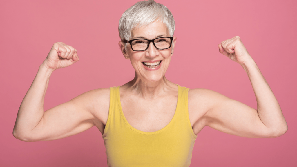 Older woman flexing and preventing muscle loss on GLP-1 weight loss medications