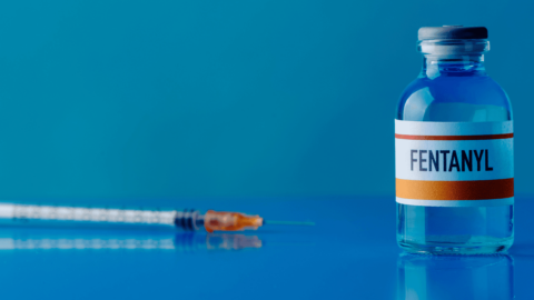 Image of a vial labeled 'Fentanyl' next to a syringe