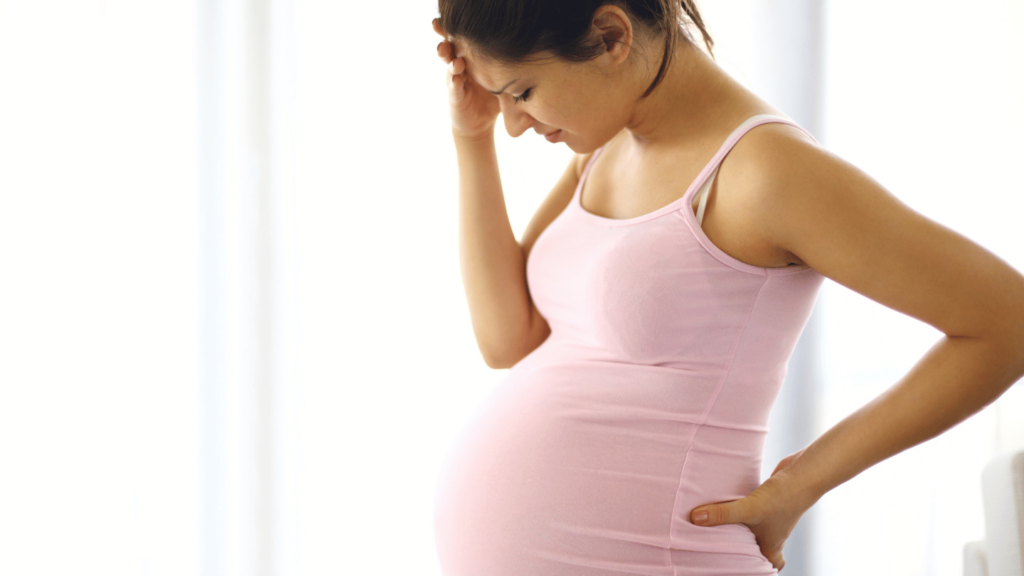 Pregnant woman worrying about neonatal abstinence syndrome