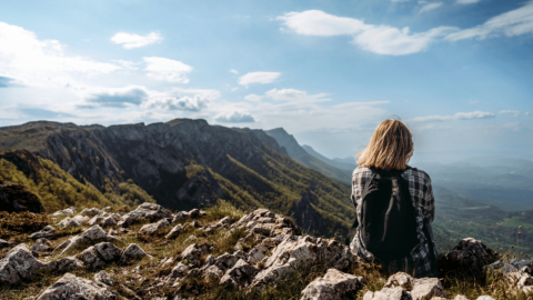 Woman hiking after recovering from opioids