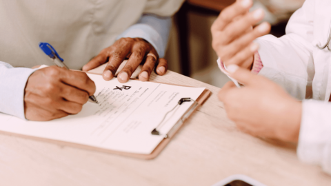 Person filling out a same day prescription for Suboxone