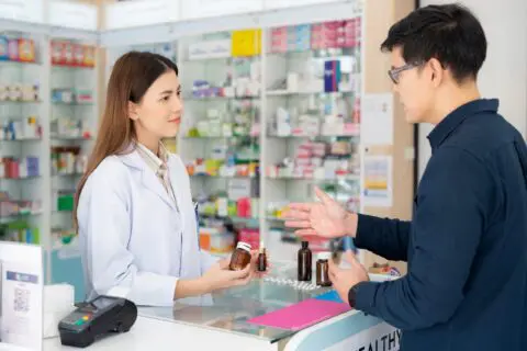 A pharmacist explaining the differences between Suboxone vs Subutex|notepad with stethoscope