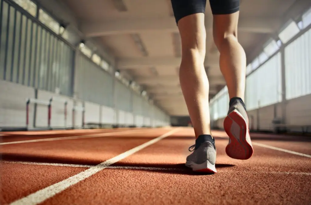 Person running to exercise and prevent gout