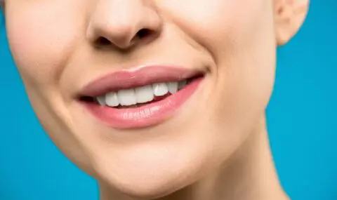 Woman smiling after using Suboxone strips correctly