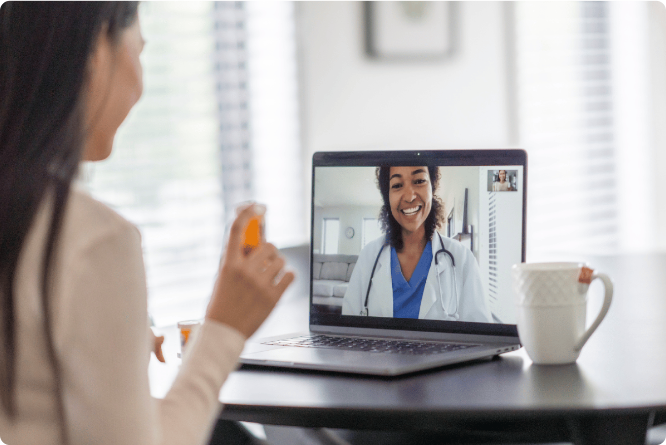 woman on a telehealth call speaking to a QuickMD doctor