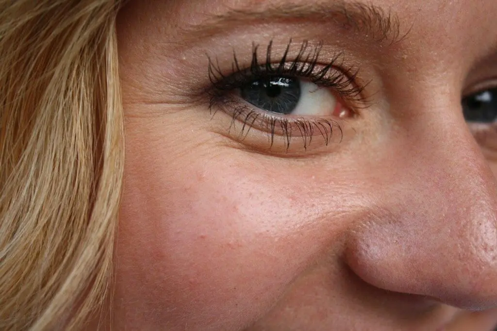 Close up Retinol effects on wrinkes near a pair of blue eyes