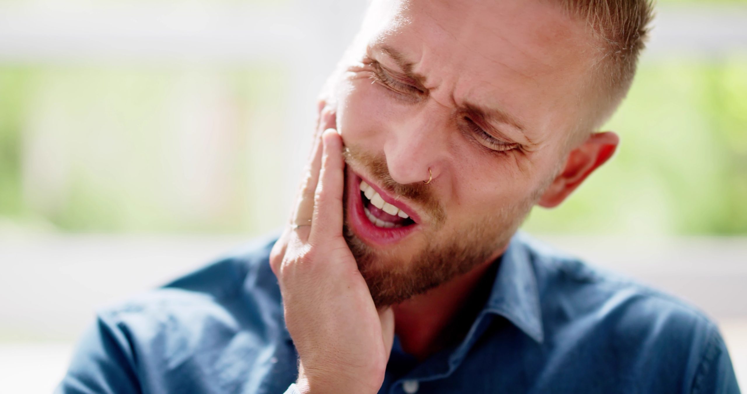 man with tooth pain from regular Suboxone use