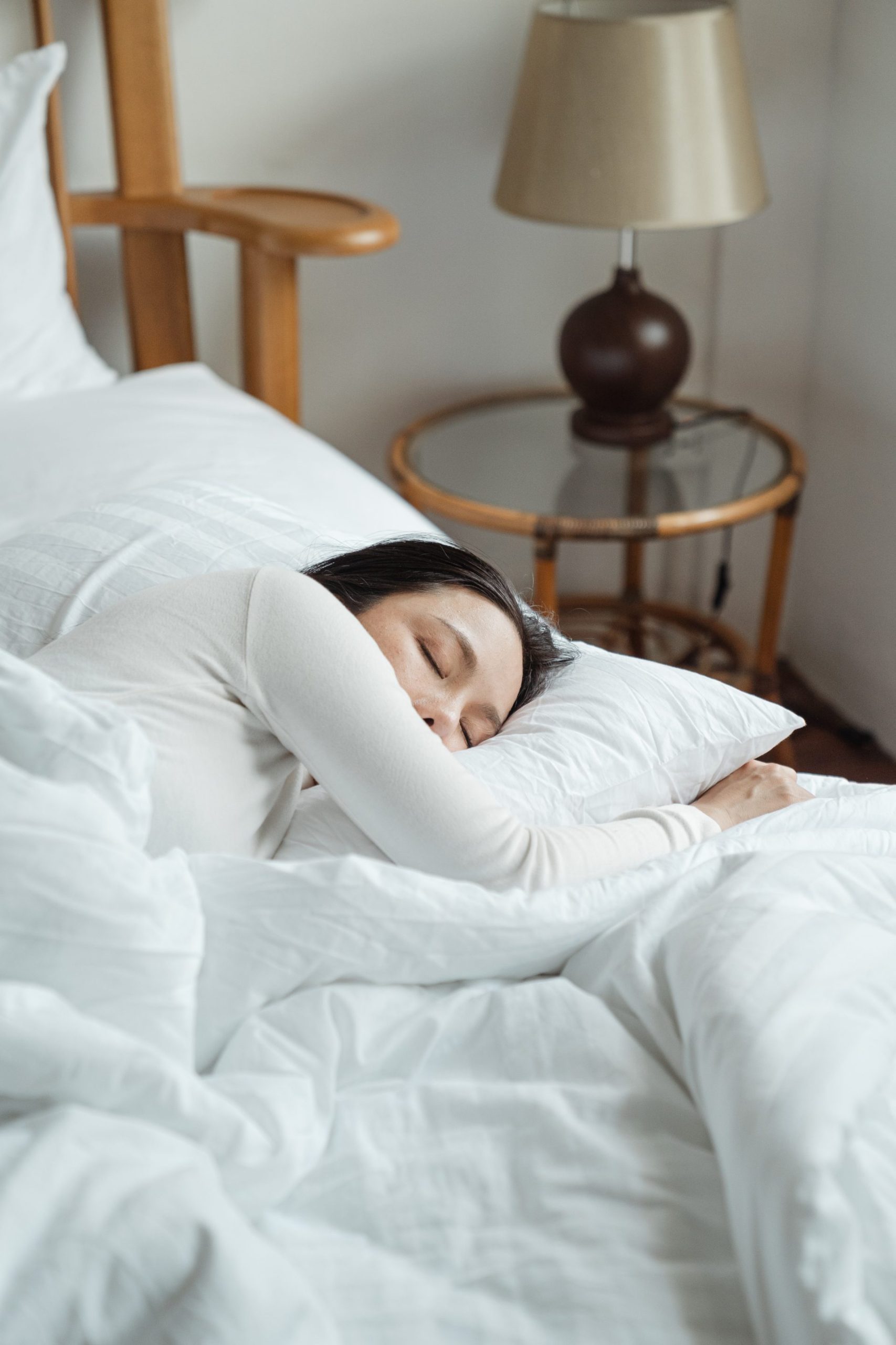 Woman practicing good sleep hygiene